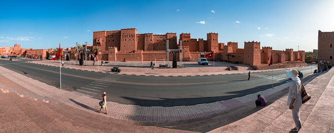 Ouarzazate, Morocco - May 11, 2023: Tourists in front of Taorirt kasbah in Ouarzazate. Morocco, Africa.