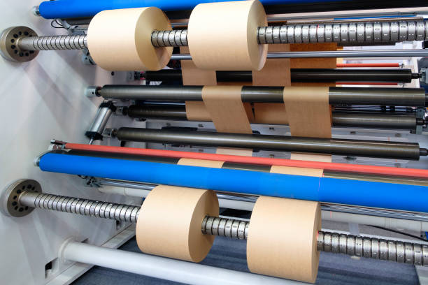 istock Printing and packaging from recycled paper rolls, industrial commercial envelope making machine, manufacture of corrugated paper and containers of paper and paperboard. 1560033036