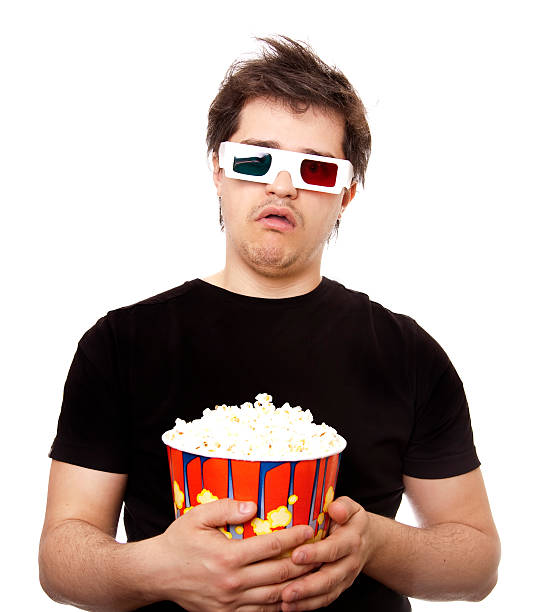 istock Funny men in stereo glasses with popcorn. 156006228