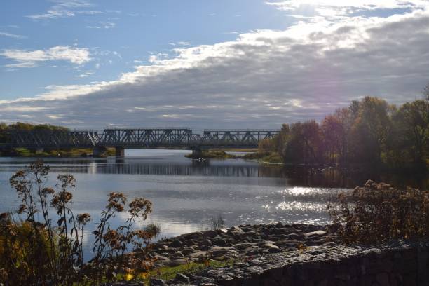 istock Scenic shot of a bridge stretching across a river 1560068814