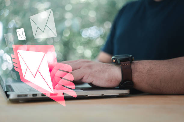 istock Man check mail every day. New email alert on laptop, communication connection message to global letters. 1560088550