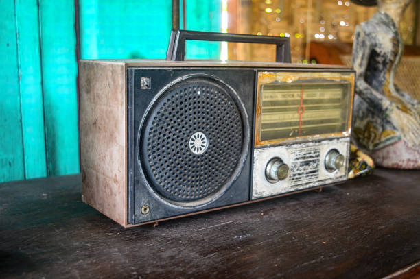 istock an old classic analog radio on a wooden table 1560101184