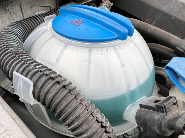 istock New Coolant Tank in Old Car 1560148253