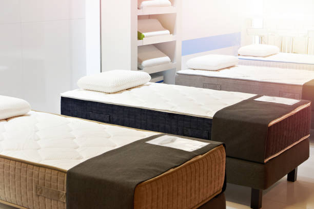 istock Modern bed with mattresses and pillows 1560155479