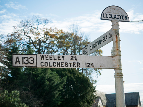 Clacton, Essex – 11.18.2020: Road sign for Little Clacton, Weeley, Colchester and Clacton-on-Sea