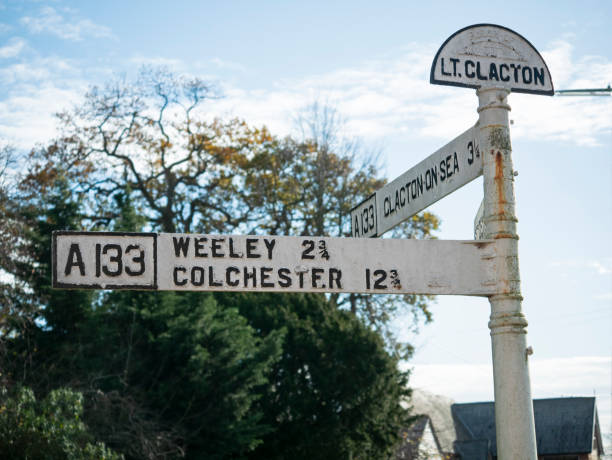 Road sign for Little Clacton, Weeley, Colchester and Clacton-on-Sea stock photo