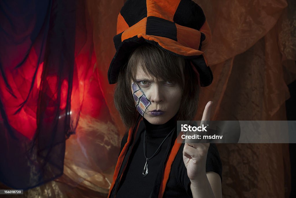 angry mad hatter clown or angry mad hatter - creative studio shot Adult Stock Photo