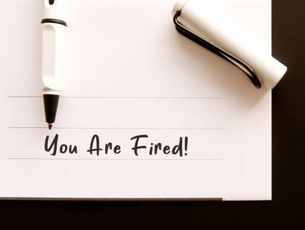 istock Pen writing on white office envelope YOU ARE FIRED!, means worker getting fired from position, boss or employer indicated employees they are discharhed from job 1560190050
