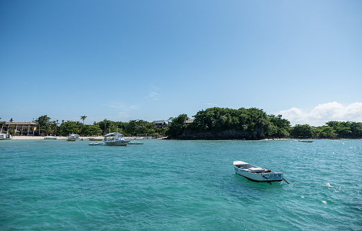 Malapascua, Philippines - February 09 2018: Beach in Malapascua. Bright White Sand with Empty Boats in Background. Philippines.