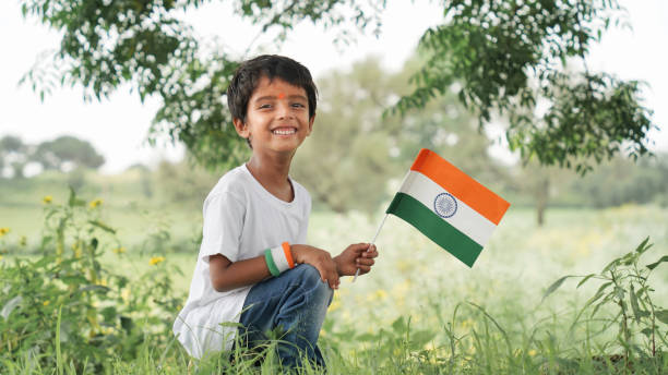istock Indian boy holding Indian flag Independence day celebration India 1560233795