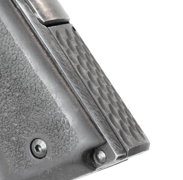 istock Mainspring housing on a semi-auto pistol 1560234337