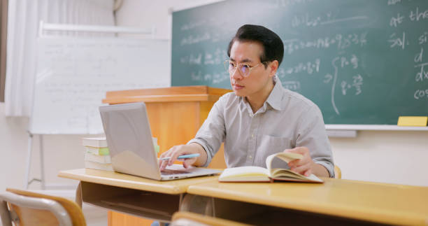 istock male professor prepare for class 1560238180