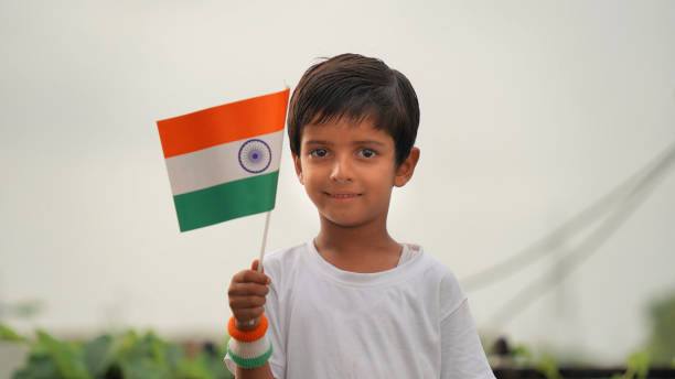 istock Indian boy holding Indian flag Independence day celebration India 1560247231