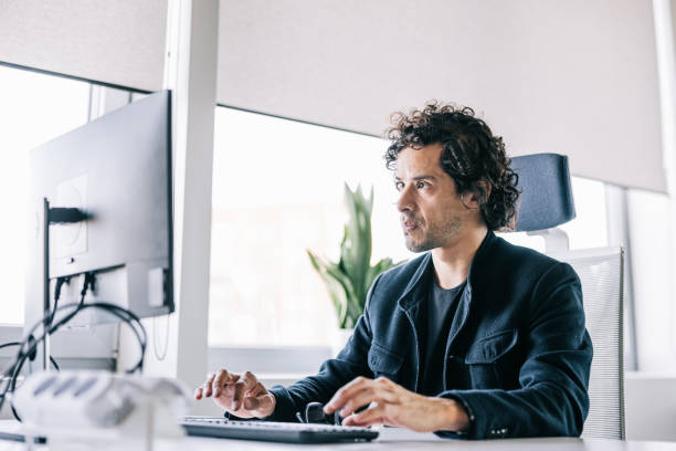 istock Focused Businessman working at the office 1560251018