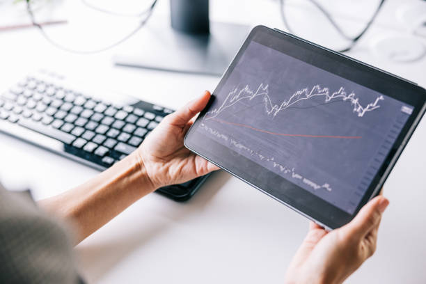istock Businesswoman working with data on a digital tablet 1560252151