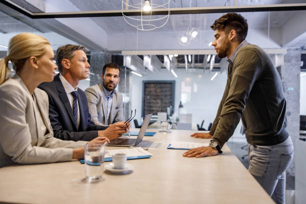 istock Human resource team talking to a candidate on job interview. 1560266077
