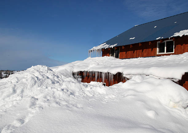 istock House buried in snow 156026865