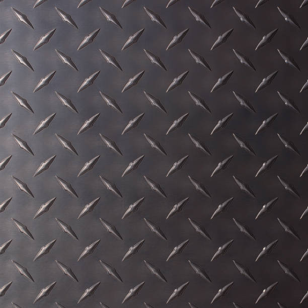 istock rough steel texture with corrugated pattern. dark metal background. 1560271472