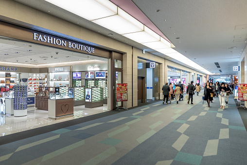 Tokyo, Japan - February 6, 2019: Tokyo International Haneda Airport. Departure Area with Duty Free Shops and People.