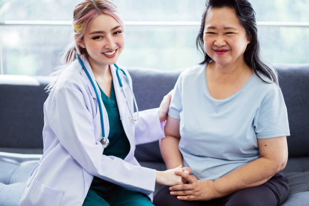 istock Doctor comforting patient 1560295378