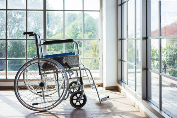 istock Wheelchair in empty hospital 1560297504
