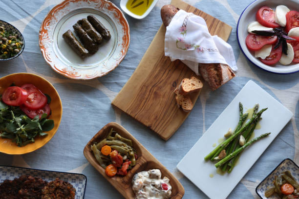 istock Fresh salad and mezes on table 1560321406