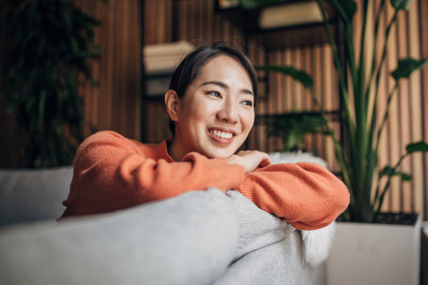 istock Woman sitting at home 1560342240