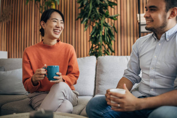 istock Friends sitting at home 1560355870