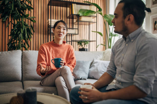 istock Friends sitting at home 1560358029