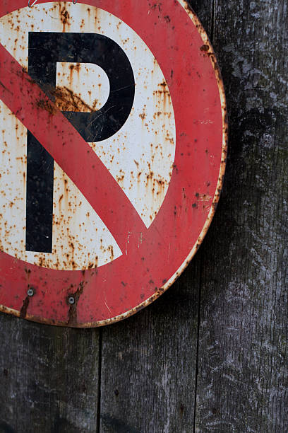 istock Vintage and rusty parking prohibited sign 156036312