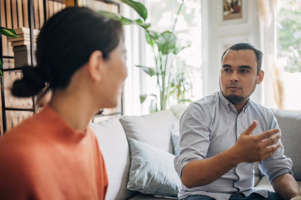 istock Friends talking at home 1560363544