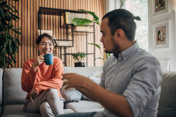 istock Friends sitting at home 1560367229