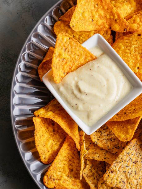 Bowl, Cheese, Food, Food and drink, Chip and dip, Chips, Potato Chip, Appetizer, Background,  Snack, Condiment, Tortilla Chip, Nacho Chip, Triangle Shape, Salsa Sauce, Sauce, popy seed