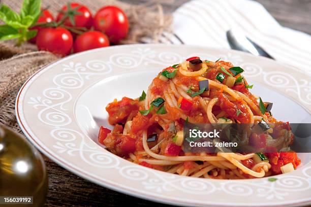 Spaghetti With Tomato Sauce And Vegetable Stock Photo - Download Image Now - Basil, Cheese, Close-up