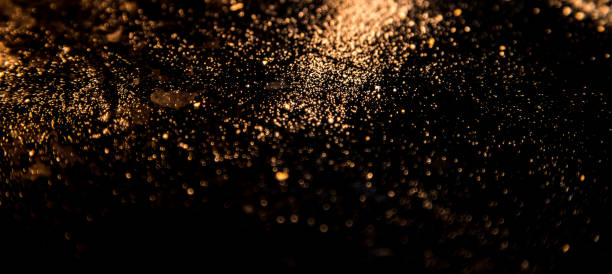 istock Abstract image made with flour and breadcrumbs on dark background. Conceptual image, alluding to space and cosmos, the unknown, light and darkness. 1560399427