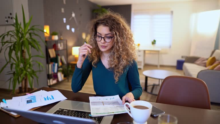 Young female student finishing her university project