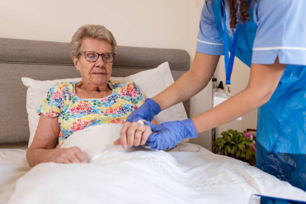 istock Receiving IV Drip Treatment 1560435735