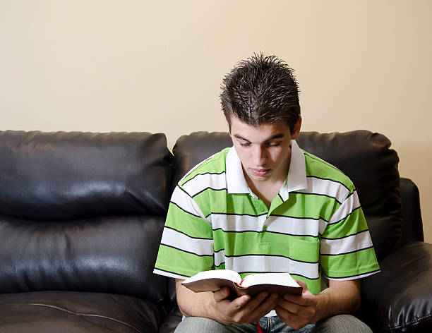 istock Teenager Having A Chirstian Devotional 156048296