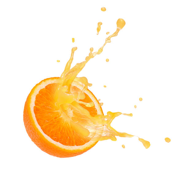 istock Orange fruit i and orange juice, splash,isolate on white 1560490277