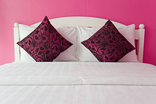 Pink Bedroom in a modern house - home interiors. stock photo