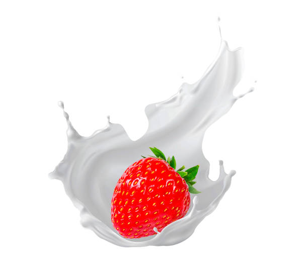 istock Splash and drops yogurt, milk, ice cream ripe strawberry 1560498872