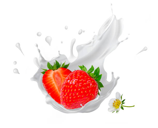 istock Splash and drops yogurt, milk, ice cream ripe strawberry 1560499381