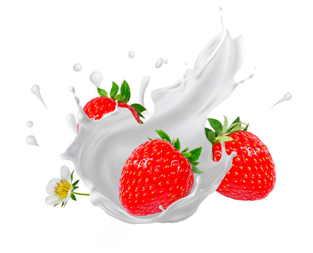 istock Splash and drops yogurt, milk, ice cream ripe strawberry 1560500972