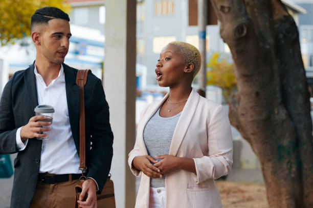 istock Young Business Colleagues Engaging Outside 1560513251
