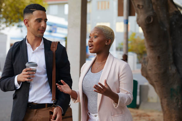 istock Young Business Colleagues Engaging Outside 1560513258