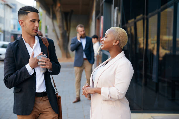 istock Young Business Colleagues Engaging Outside 1560521268