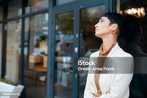 istock Time and Patience: A Young Businesswoman's Wait for Opportunity 1560526223
