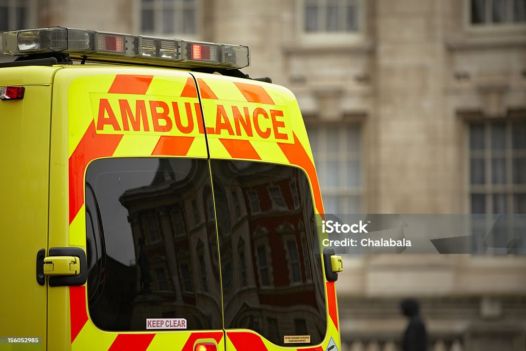 European style ambulance in front of building Door of the emergency ambulance car - selective focus Ambulance Stock Photo