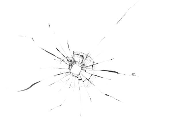 istock The texture of broken glass. Bullet hole 1560529964