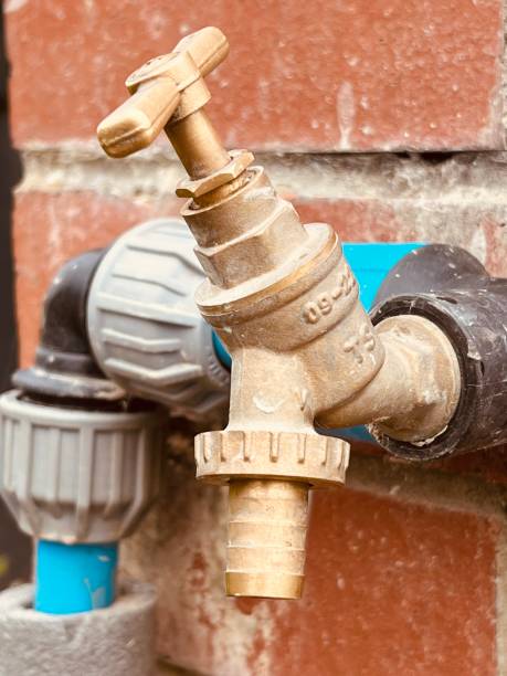 istock An outdoor water tap against a brick wall 1560532259